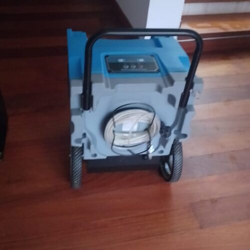 Dehumidifier drying flooded floor
