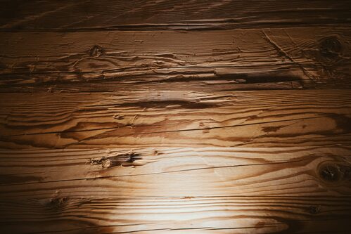 warped wooden floor caused by water damage